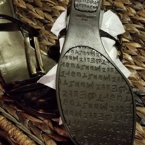 Brown Patent Leather sandals.